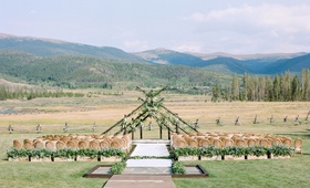 Ceremony Overlooking Colorado Mountains
Photography: Rachel Havel Photography
Read More:
http://www.insideweddings.com/weddings/unique-boho-chic-wedding-inspired-by-blue-agate-in-colorado/1362/ wedding at devil's thumb ranch colorado mountain wedding