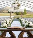Church-Inspired Guest Book Table
Photography: Perez Photography
Read More:
http://www.insideweddings.com/weddings/incredible-tented-ceremony-barn-reception-at-ranch-in-aspen/860/ Outdoor tent wedding Aspen Colorado ranch with wood slab on church table for guest book display