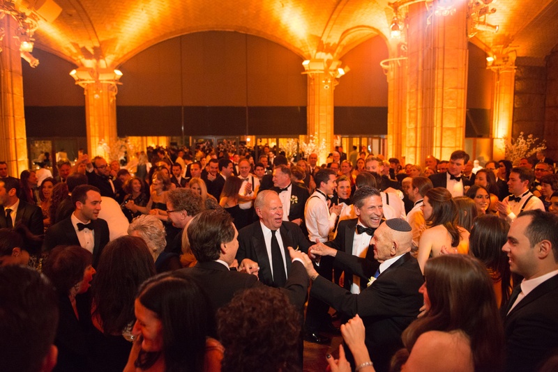 Guests on the Dance Floor
Photography: Ira Lippke Studios
Read More:
http://www.insideweddings.com/weddings/chic-classic-new-york-city-wedding-with-personal-touches/783/ guests dressed to impress dance and laugh on the dance floor during the reception