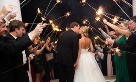Sparkler Wedding Exit
Photography: Aaron Watson Photography
Read More:
http://www.insideweddings.com/weddings/classic-virginia-wedding-inspired-by-grace-kellys-elegance/511/ Bride and groom kiss under tunnel of sparklers