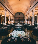 Wintry Décor at Vibiana in LA
Photography: Jimmy Bui Photography
Read More:
http://www.insideweddings.com/weddings/elegant-edgy-wedding-inspired-by-disney-at-vibiana-in-downtown-la/1229/ wedding reception sweetheart table with view of guests at vibiana white columns black white decor