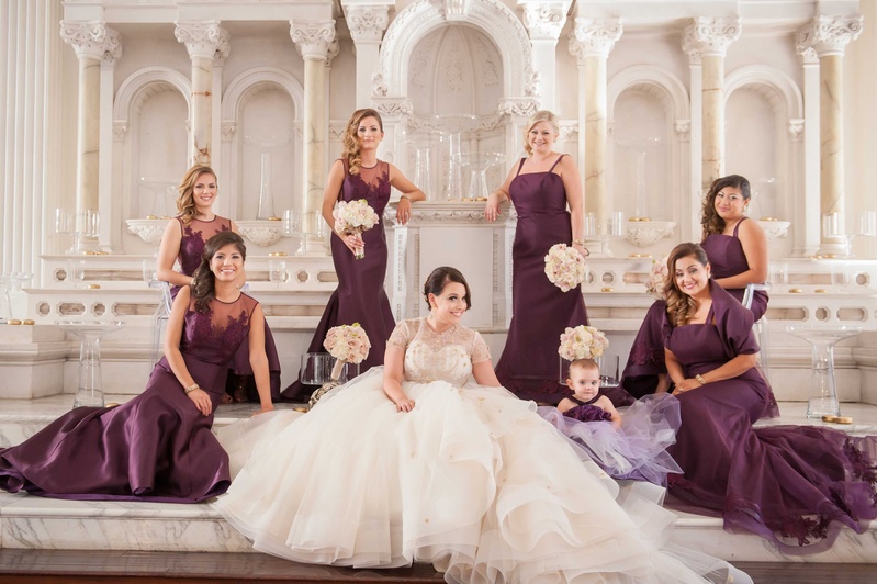 Bridesmaids in Purple Mismatched Long Dresses
Photography: KLK Photography
Read More:
http://www.insideweddings.com/weddings/greek-orthodox-church-ceremony-glamorous-purple-gold-reception/730/ Bride in white and gold ball gown with six bridesmaids in long purple bridesmaid dresses