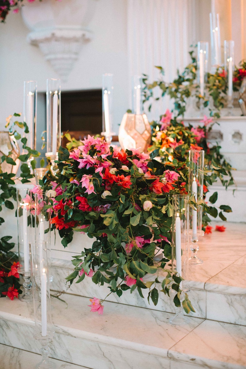 Cascading Florals at Ceremony Altar
Photography: Krista Mason Photography
Read More:
http://www.insideweddings.com/weddings/mediterranean-inspired-styled-shoot-featuring-unique-details/856/ cascading bold florals ceremony altar marble steps glass votives