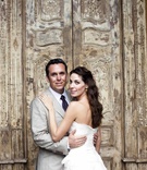 The Bride and Groom
Photography: lunaphoto
Read More:
http://www.insideweddings.com/weddings/tangerine-hued-summer-destination-wedding-in-costa-rica/311/ Newlyweds in front of large door in Costa Rica