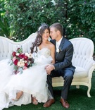 Bride and Groom Cuddle on Loveseat
Photography: David Manning Photographer
Read More:
http://www.insideweddings.com/weddings/interfaith-ceremony-tented-reception-with-romantic-color-palette/885/ bride in alfred angelo gown, groom in dark navy grey suit from the black tux sit on fancy loveseat