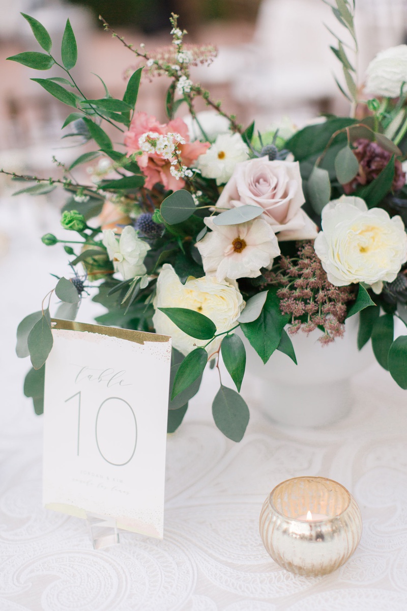 White %26 Gold Table Number
Photography: Anya Kernes Photography
Read More:
http://www.insideweddings.com/weddings/outdoor-wedding-with-dusty-rose-powder-blue-lavender-palette/1288/ wedding reception white textured linen low centerpiece ivory pink flowers greenery gold white number