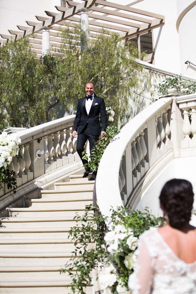 Bride Awaiting Groom for "First Look"
Photography: Samuel Lippke Studios
Read More:
http://www.insideweddings.com/weddings/outdoor-jewish-wedding-ceremony-luxe-reception-in-california/1160/ First look at monarch beach resort in dana point southern california groom walking down steps bride