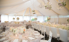 Charming Tent Wedding
Photography: Carrie Rodman Photography
Read More:
http://www.insideweddings.com/weddings/new-england-summer-wedding-by-the-seashore/429/ White drapery and chandeliers on ceiling of tented reception