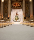 Ceremony with Flower Wall %26 Candles
Photography: Duke Photography
Read More:
http://www.insideweddings.com/weddings/grand-wedding-with-regal-decor-and-golden-details-in-washington-dc/1117/ Wedding ceremony white aisle runner candles along side hurricane white chuppah flower wall