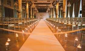 Candlelit Aisle for Chicago Ceremony
Photography: Peter Gubernat Photography
Read More:
http://www.insideweddings.com/weddings/spring-real-wedding-with-ivory-blush-gold-details-in-chicago/1184/ wedding ceremony at the drake hotel chicago white aisle runner hurricane vase candles candlelight