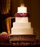 White and Purple Wedding Cake
Photography: Jay Lawrence Goldman Photography
Read More:
http://www.insideweddings.com/weddings/classic-contemporary-ballroom-wedding-in-pacific-palisades/264/ Square and round cake with lace design