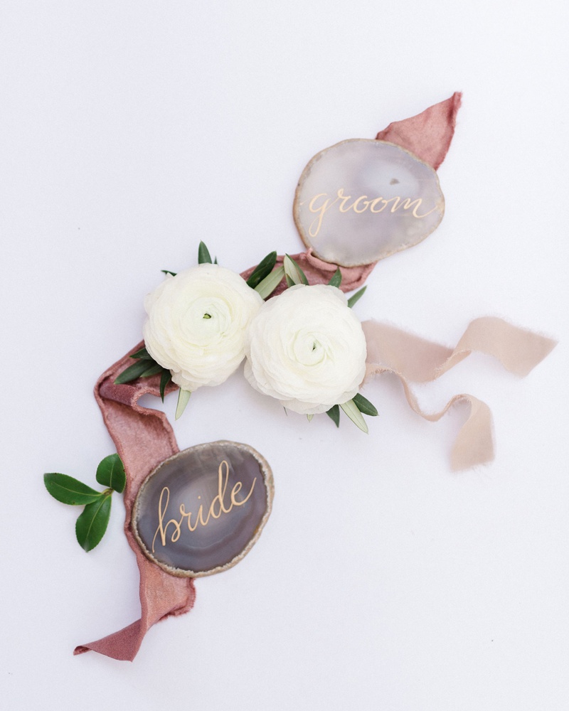 Agate Slices for Bride and Groom
Photography: Anya Kernes Photography
Read More:
http://www.insideweddings.com/weddings/outdoor-wedding-with-dusty-rose-powder-blue-lavender-palette/1288/ wedding reception place setting bride groom card agate slice ranunculus flower ribbon greenery