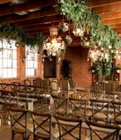 Wedding Ceremony with Wood Beams
Photography: Michael Segal Photography
Read More:
http://www.insideweddings.com/weddings/brittany-daniel-and-adam-touni/1110/ Wood beams brick wall urban chic wedding ceremony venue chandelier greenery vineyard chairs benches