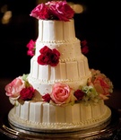 Striped Wedding Cake
Photography: Studio Nine Photography
Read More:
http://www.insideweddings.com/weddings/romantic-summer-chateau-wedding-in-new-jersey/324/ White cake with stripes, dots, and fresh pink flowers