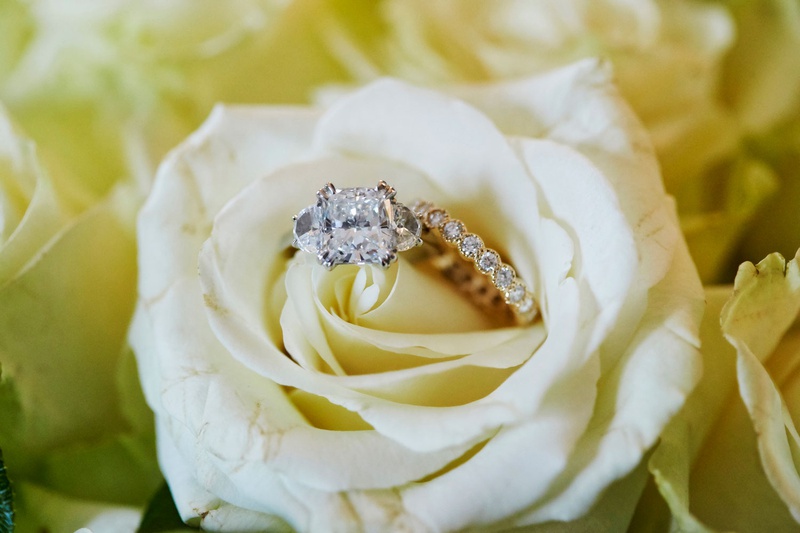 Engagement Ring with Side Stones
Photography: KingenSmith
Read More:
http://www.insideweddings.com/weddings/luxurious-wedding-featuring-sentimental-butterfly-decor-in-chicago/1348/ wedding jewelry engagement ring and wedding band diamond in white rose flower