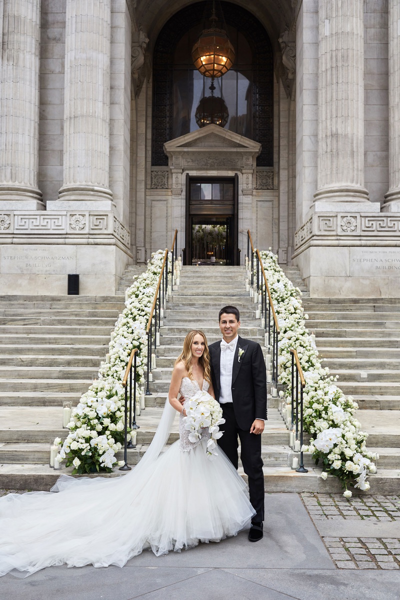 Couple in Front of New York Public Library
Photography: Christian Oth Studio
Read More:
http://www.insideweddings.com/weddings/traditional-cathedral-wedding-luxury-reception-in-new-york-city/1331/ bride in galia lahav wedding dress cathedral veil groom tux white bow tie new york library steps