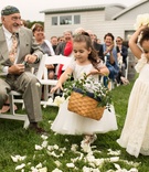 Flower Girls Tossing Petals from Basket
Photography: Joshua Behan
Read More:
http://www.insideweddings.com/weddings/lyndsy-fonseca-and-noah-bean/992/ Flower girls tossing white flower petals short sleeve dresses grass aisle outdoor wedding