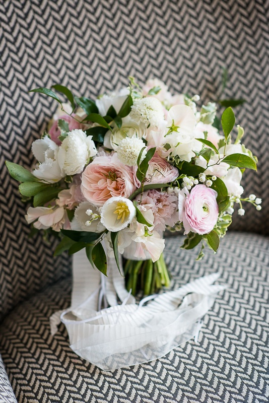 Pink %26 Ivory Bouquet with Greenery
Photography: Kent Drake Photography
Read More:
http://www.insideweddings.com/weddings/an-event-planners-wedding-at-a-museum-by-sue-the-tyrannosaurus-rex/955/ Bride's bouquet with pink ranunculus, tulips, peonies, garden roses and verdure, lily of the valley