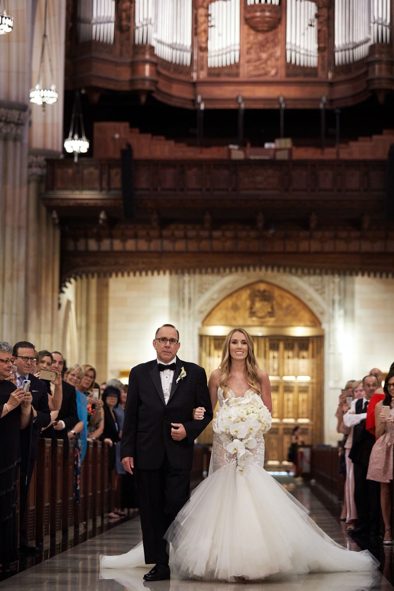 Bride with Father at NY Cathedrall
Photography: Christian Oth Studio
Read More:
http://www.insideweddings.com/weddings/traditional-cathedral-wedding-luxury-reception-in-new-york-city/1331/ bride in galia lahav wedding dress trumpet gown orchid bouquet father processional church pews