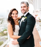 Bride %26 Groom on Balcony at Venue
Photography: Birds of a Feather
Read More:
http://www.insideweddings.com/weddings/church-ceremony-sparkling-pink-ballroom-reception-with-city-views/1084/ Bride in wedding dress hugging groom in tuxedo boutonniere on balcony of mr c beverly hills