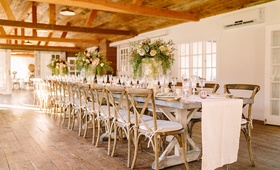Long Wooden Tablescape, Rustic Motif
Photography: Brian Leahy Photography
Read More:
http://www.insideweddings.com/weddings/rustic-chic-engagement-party-inspiration-at-a-california-farmhouse/935/ long wooden tablescape motif faux wedding party styled shoot rustic event white runner green florals
