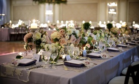 Candlelit Tablescape
Photography: David Wittig Photography
Read More:
http://www.insideweddings.com/weddings/vintage-inspired-chicago-wedding-with-rustic-elements/441/ Silver linens topped with blush and ivory flowers