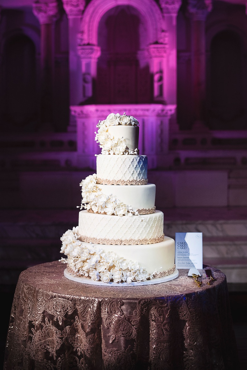 Sugar Flowers %26 Moroccan Lace Cake
Photography: Callaway Gable
Read More:
http://www.insideweddings.com/weddings/modern-in-the-round-ceremony-whimsical-garden-inspired-reception/1155/ Wedding cake five layer fondant confection sugar flowers wrapping around each layer moroccan lace