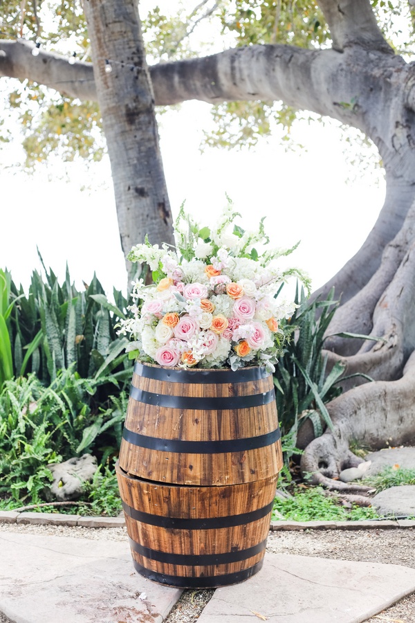 Ceremony Décor Photos Wood Barrel with Rose Arrangement Inside Weddings