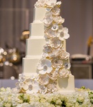 Square Cake with Ivory Sugar Flowers
Photography: Genevieve Nisly Photography
Read More:
http://www.insideweddings.com/weddings/new-years-eve-wedding-with-a-dreamy-winter-wonderland-theme/1258/ wedding cake five square layers white sugar flower cake topper cascading down layers