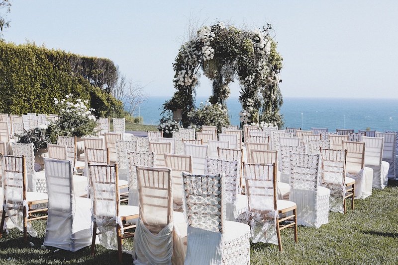 Lace Chair Covers
Photography: Daniel Kincaid Photography
Read More:
http://www.insideweddings.com/weddings/brittney-palmer-and-aaron-zalewski/595/ Brittney Palmer's oceanfront wedding ceremony