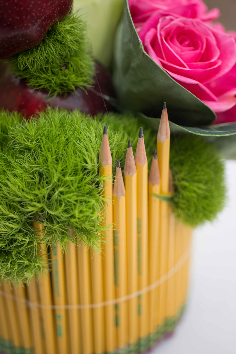 Sharpened Pencil Vase
Photography: John %26 Joseph Photography Inc.
Read More:
http://www.insideweddings.com/weddings/a-school-themed-bridal-shower-in-beverly-hills-for-a-teacher/890/ Pink rose green moss #2 pencil sharpened with erasers at bottom vase bridal shower school theme