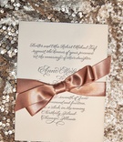 Calligraphy Wedding Invite with Bow
Photography: KingenSmith
Read More:
http://www.insideweddings.com/weddings/luxurious-summer-tent-wedding-on-lake-michigan-in-chicago-illinois/671/ Cream wedding invitation with script font and copper bow