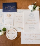 Multi-Piece Invitation Suite
Photography: Wendy Wilson Photography
Read More:
http://www.insideweddings.com/weddings/romantic-rooftop-ceremony-ballroom-reception-in-new-orleans/991/ nico & lala custom invitation suite with blue and gold