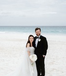Formal Destination Wedding Couple
Photography: Grant Daniels Photography
Read More:
http://www.insideweddings.com/weddings/destination-wedding-with-tent-reception-on-the-beach-in-the-bahamas/1303/ bride in off shoulder dress with groom in tuxedo on beach in the bahamas harbour island white sand