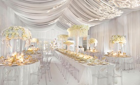 White Draped Reception Space
Photography: Milanés Photography
Read More:
http://www.insideweddings.com/weddings/glamorous-white-gold-wedding-at-a-private-estate-in-georgia/1060/ Wedding reception decorations all white drapery gold accents white flowers akeem clayton designs