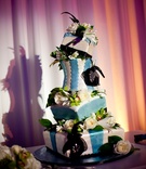 Whimsical Wedding Cake
Photography: Jessica Lewis Photography
Read More:
http://www.insideweddings.com/weddings/summer-wedding-at-the-sls-hotel-beverly-hills-california/460/ Blue and white tiltilng cake with black flowers