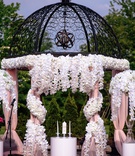 Iron Ceremony Structure with Flowers
Photography: Alakija Studios
Read More:
http://www.insideweddings.com/weddings/fairy-tale-wedding-with-vibrant-blush-fuchsia-gold-decor/1252/ wedding ceremony iron structure gazebo with white orchid flowers and drapery outdoor wedding