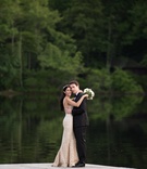 Newlyweds Hug in Front of Lake
Photography: Ira Lippke Studios
Read More:
http://www.insideweddings.com/weddings/a-lakeside-black-tie-wedding-with-a-summer-camp-theme/938/ groom in Ermenegildo Zegna hugs bride in mark ingram blush wedding dress in front of lake
