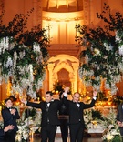 Celebrating Grooms
Photography: Fitz Carlile Photography
Read More:
http://www.insideweddings.com/weddings/luxurious-wedding-with-personalized-details-in-downtown-los-angeles/1355/ same-sex wedding inspiration, gay couple lifts arms in celebration after wedding ceremony