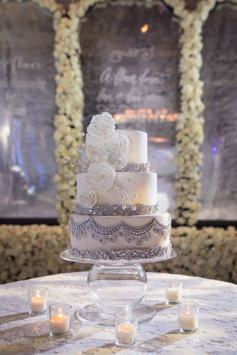 Jewelry-Inspired Wedding Cake
Photography: Collin Pierson Photography
Read More:
http://www.insideweddings.com/weddings/winter-wedding-inspirational-shoot-with-opulent-frosted-decor/1108/ Wedding cake three layer white sugar flower silver embellishments beads pearls