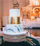 Disney-Inspired Marble Wedding Cake
Photography: Jimmy Bui Photography
Read More:
http://www.insideweddings.com/weddings/elegant-edgy-wedding-inspired-by-disney-at-vibiana-in-downtown-la/1229/ wedding cake at vibiana marble tier gold layer happily ever cake topper gold
