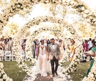 Ivory Floral Arches at Ceremony