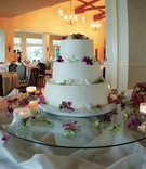 Round Hawaiian Wedding Cake
Photography: Scott A. Nelson Photography
Read More:
http://www.insideweddings.com/weddings/colorful-seaside-wedding-in-southern-california/16/ White round cake with three tiers and flowers