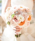 Pale-Hued Bridal Bouquet
Photography: Samuel Lippke Studios
Read More:
http://www.insideweddings.com/weddings/dreamy-newport-beach-california-wedding-with-breathtaking-decor/425/ Bride carrying garden roses and gardenias