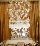 Ice Sculpture with Couple's Wedding Logo
Photography: Karlisch Studio
Read More:
http://www.insideweddings.com/weddings/classic-ceremony-at-smu-chapel-ballroom-reception-in-dallas/731/ Ice sculpture at wedding reception with fleur de lis, monogram, and bluebonnets