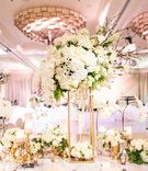 Tall Ivory Centerpiece on Gold Stand
Photography: Jacqui Cole Photography
Read More:
http://www.insideweddings.com/weddings/timeless-luxury-wedding-with-personalized-details-in-austin-texas/1377/ wedding reception flower print table ballroom gold stand white orchid hydrangea anemone rose branch