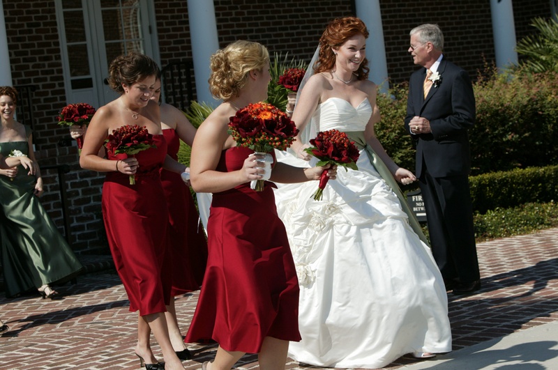Short Red Bridesmaid Dresses
Photography: Mark Staff Photography
Read More:
http://www.insideweddings.com/weddings/autumn-inspired-golf-club-wedding-in-south-carolina/149/ Bride in white ball gown with bridesmaids in short red dresses