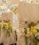 Gold Chair Interlaces with Flowers
Photography: Carasco Photography
Read More:
http://www.insideweddings.com/weddings/parisian-inspired-styled-shoot-with-spring-florals/956/ gold chair interlaces with yellow orchids, white roses, and green amaranths