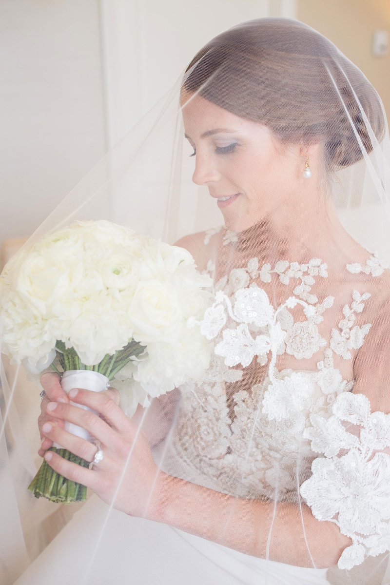 Bride in Blusher Veil
Photography: Carrie Rodman Photography
Read More:
http://www.insideweddings.com/weddings/intimate-destination-wedding-with-classic-decor-in-palm-beach/1302/ bride in pronovias atelier wedding dress with blusher veil over head, ivory bridal bouquet