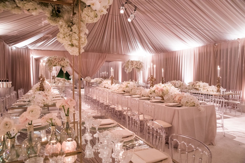 Blush Tented Wedding Reception
Photography: Samuel Lippke Studios
Read More:
http://www.insideweddings.com/weddings/glamorous-alfresco-ceremony-ballroom-reception-and-after-party/1041/ Pink tent wedding reception long tables clear chairs white flowers high low centerpieces